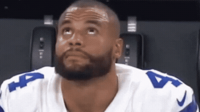 A Man With A Beard Wearing A Number 4 Jersey Looks Up GIF