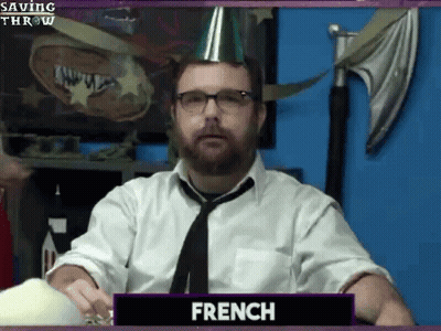 A Man With A Beard Wearing A Party Hat And Tie Is Called French GIF