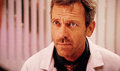 A Man With A Beard Wearing A Pink Coat And Tie GIF