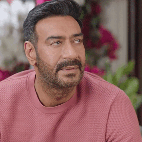 A Man With A Beard Wearing A Pink Shirt GIF