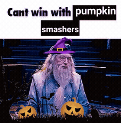 A Man With A Beard Wearing A Purple Hat With Pumpkins In The Background GIF
