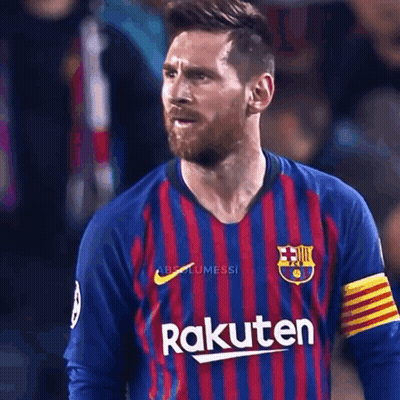A Man With A Beard Wearing A Rakuten Shirt GIF