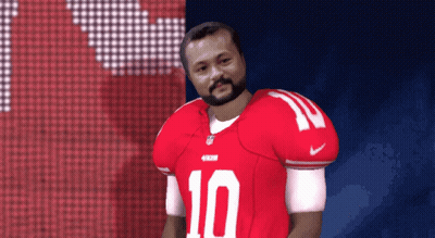 A Man With A Beard Wearing A Red Jersey With The Number 10 On It GIF