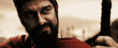 A Man With A Beard Wearing A Red Shirt GIF