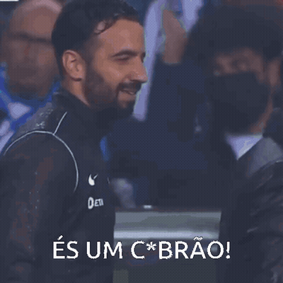 A Man With A Beard Wearing A Scp Jacket Is Smiling GIF