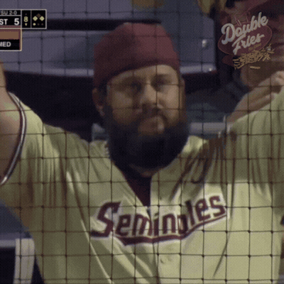A Man With A Beard Wearing A Seminoles Jersey GIF