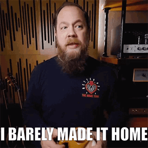 A Man With A Beard Wearing A Shirt That Says The Road Team GIF