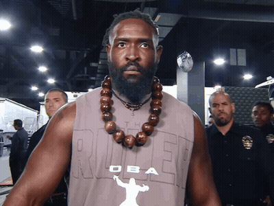 A Man With A Beard Wearing A Shirt That Says The Ruler GIF