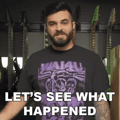 A Man With A Beard Wearing A Shirt That Says Wai4u GIF