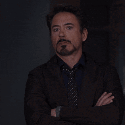 A Man With A Beard Wearing A Suit And Tie GIF