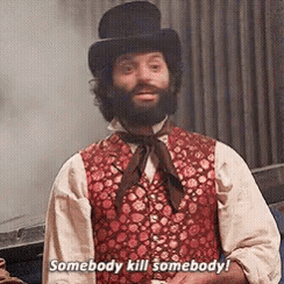 A Man With A Beard Wearing A Top Hat And A Vest Says Somebody Kill Somebody GIF
