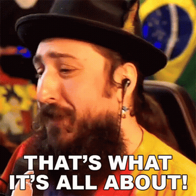 A Man With A Beard Wearing A Top Hat And Earbuds Says That 'S What It 'S All About GIF
