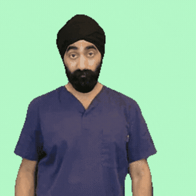 A Man With A Beard Wearing A Turban And Scrubs Is Making A Gesture With His Hands GIF