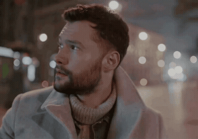 A Man With A Beard Wearing A White Coat GIF