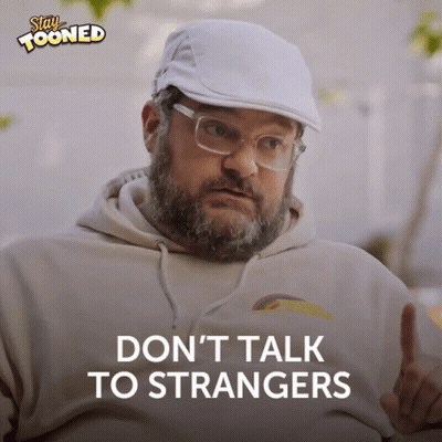 A Man With A Beard Wearing A White Hat And Glasses Says " Don 'T Talk To Strangers " GIF