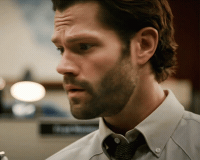 A Man With A Beard Wearing A White Shirt And A Tie GIF