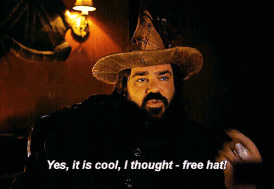 A Man With A Beard Wearing A Wizard Hat Says " Yes It Is Cool I Thought Free Hat " GIF