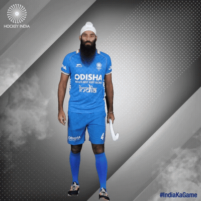 A Man With A Beard Wearing An Odisha Jersey GIF