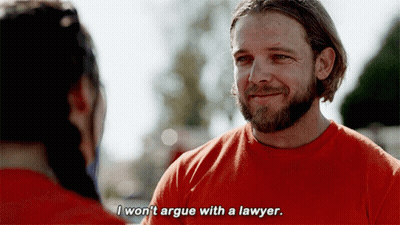 A Man With A Beard Wearing An Orange Shirt Says I Won 'T Argue With A Lawyer GIF