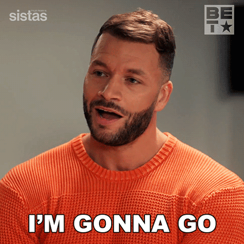 A Man With A Beard Wearing An Orange Sweater Says I 'M Gonna Go GIF