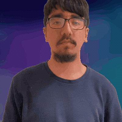 A Man With A Beard Wearing Glasses And A Black Shirt GIF
