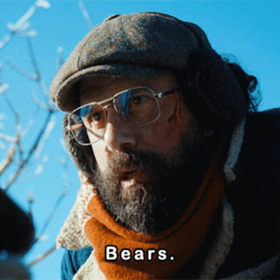 A Man With A Beard Wearing Glasses And Ear Muffs Says " Bears " GIF