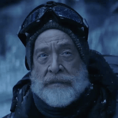 A Man With A Beard Wearing Goggles And A Scarf GIF