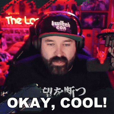 A Man With A Beard Wearing Headphones And A Hat That Says Twitch Con 2022 GIF