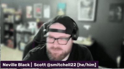 A Man With A Beard Wearing Headphones And A Hat With The Name Neville Black On The Bottom GIF