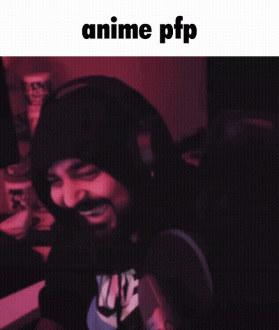 A Man With A Beard Wearing Headphones And A Shirt That Says " Anime Pfp " On It GIF
