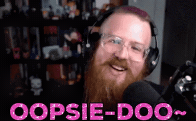 A Man With A Beard Wearing Headphones And Glasses Says Oopsie-Doo In Pink Letters GIF