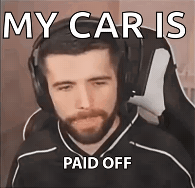 A Man With A Beard Wearing Headphones Is Making A Meme About His Car Being Paid Off GIF