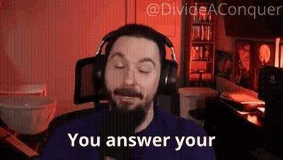 A Man With A Beard Wearing Headphones Is Talking Into A Microphone And Saying `` You Answer Your '' . GIF