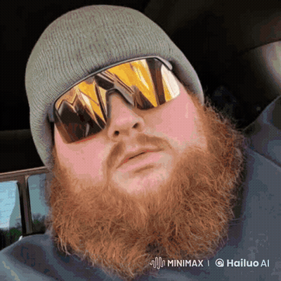 A Man With A Beard Wearing Sunglasses And A Beanie Is Being Animated By Hailuo Ai GIF