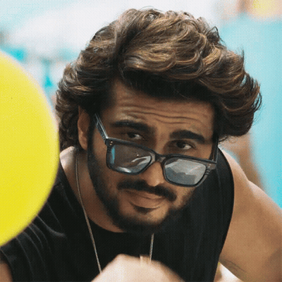 A Man With A Beard Wearing Sunglasses And A Black Shirt GIF