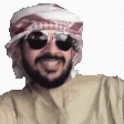 A Man With A Beard Wearing Sunglasses And A Scarf Around His Head . GIF