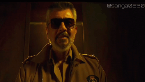Man With Beard Sunglasses And Bad Boy Shirt GIF