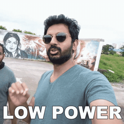 A Man With A Beard Wearing Sunglasses And A Shirt That Says Low Power On It GIF