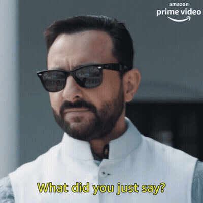 A Man With A Beard Wearing Sunglasses And A White Vest Says What Did You Just Say GIF