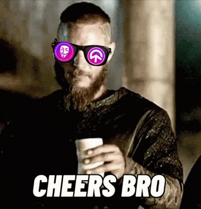 A Man With A Beard Wearing Sunglasses Is Holding A Cup Of Coffee And Says `` Cheers Bro '' . GIF
