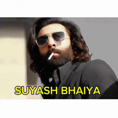 A Man With A Beard Wearing Sunglasses Is Smoking A Cigarette With The Words Suyasha Bhaiya Written Below Him GIF
