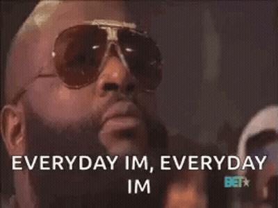 A Man With A Beard Wearing Sunglasses Says Everyday Im Everyday Im GIF