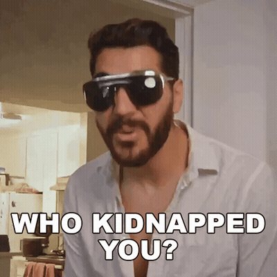 A Man With A Beard Wearing Sunglasses Says " Who Kidnapped You " GIF