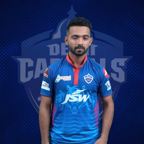 A Man With A Beard Wears A Blue Jersey With Jsw On It GIF