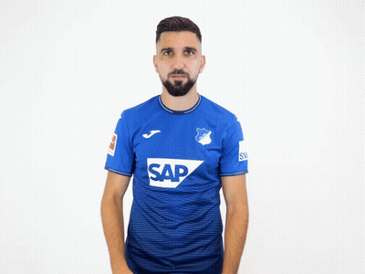 A Man With A Beard Wears A Blue Shirt That Says Sap GIF