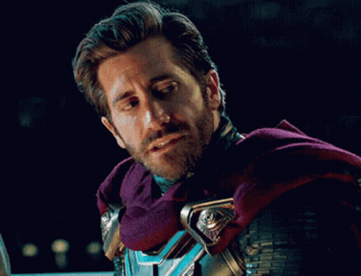 A Man With A Beard Wears A Purple Cape GIF
