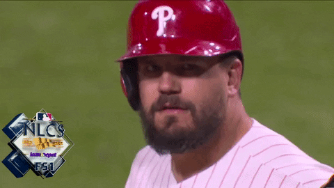 A Man With A Beard Wears A Red Helmet With The Letter P On It GIF