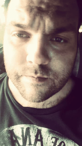A Man With A Beard Wears A Shirt That Says Awa 30 GIF