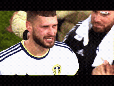 A Man With A Beard Wears A White And Blue Adidas Jersey GIF