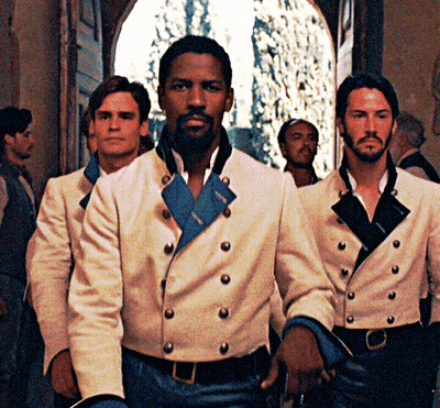 A Man With A Beard Wears A White Jacket With Buttons GIF